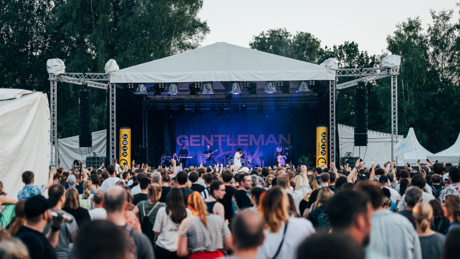 Gentleman on stage in front of his audience