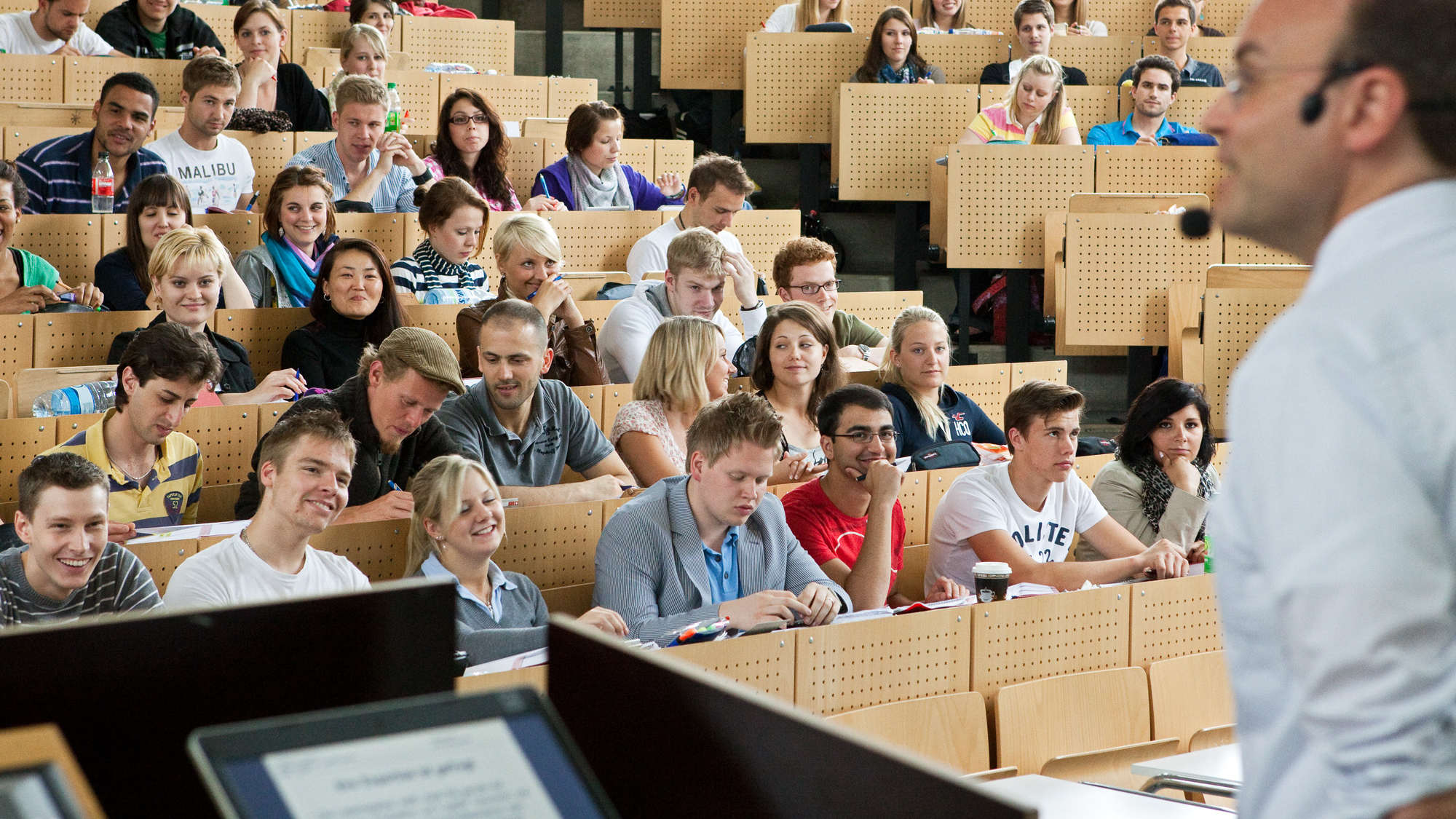 A full lecture hall from the lecturer's point of view.