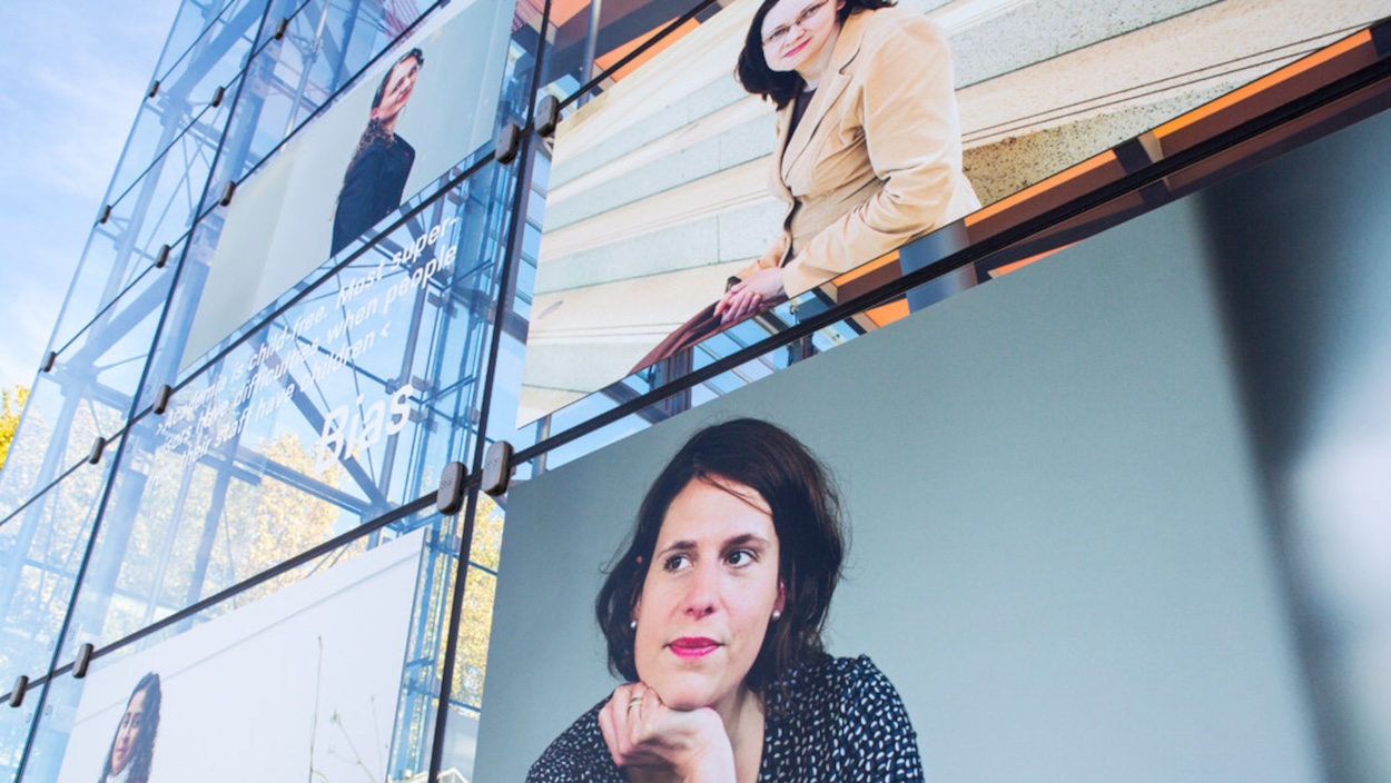 Pictures of four women are placed on the glass hall of the University of Bremen.